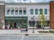Charming storefronts with awnings, offering a delightful shopping experience in a vibrant neighborhood setting at 3845 Overlake Dr, Cumming, GA 30041