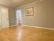 Bedroom featuring hardwood floors and neutral paint at 7680 Banks Mill Road Rd, Douglasville, GA 30135