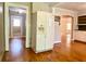 Eat-in kitchen area features a refrigerator and connects to the bathroom and dining area at 7680 Banks Mill Road Rd, Douglasville, GA 30135
