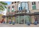 Exterior shot of the building entrance with Five Guys next door at 860 Peachtree St # 1103, Atlanta, GA 30308