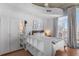 Bright main bedroom featuring hardwood floors, a downtown view, and a large closet at 860 Peachtree St # 1103, Atlanta, GA 30308