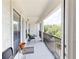 Enjoy the view from the balcony with black metal railings and a chair at 3275 Lenox Ne Rd # 413, Atlanta, GA 30324