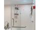 Close up of bathroom's stand alone shower and soaking tub with modern hardware and finishes at 3275 Lenox Ne Rd # 413, Atlanta, GA 30324