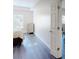 Spacious bedroom view from hallway featuring hardwood flooring and natural light at 3275 Lenox Ne Rd # 413, Atlanta, GA 30324