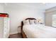 Neutral primary bedroom with a ceiling fan and a window letting in natural light at 3275 Lenox Ne Rd # 413, Atlanta, GA 30324