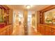 Hallway featuring wood floors, decorative accents, and classic architectural design at 3275 Lenox Ne Rd # 413, Atlanta, GA 30324