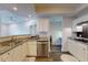 Kitchen with granite countertops, stainless steel appliances and white cabinets at 3275 Lenox Ne Rd # 413, Atlanta, GA 30324