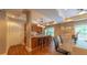 Kitchen with a breakfast bar, light fixtures, and appliances adjacent to the dining area at 3275 Lenox Ne Rd # 413, Atlanta, GA 30324
