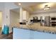 Kitchen with stainless steel appliances, white cabinets, and granite countertops at 3275 Lenox Ne Rd # 413, Atlanta, GA 30324