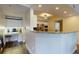 This kitchen features an eat in bar with granite countertops, stainless appliances and recessed lighting at 3275 Lenox Ne Rd # 413, Atlanta, GA 30324