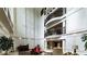 Grand lobby with soaring ceilings, ornate details, and comfortable seating areas for residents and guests at 3275 Lenox Ne Rd # 413, Atlanta, GA 30324