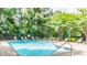 Inviting community pool with lounge chairs and umbrellas, perfect for relaxation and enjoyment at 3275 Lenox Ne Rd # 413, Atlanta, GA 30324