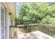 Balcony overlooking private wooded backyard provides the perfect place to relax and unwind at 7420 Bristol Cir, Douglasville, GA 30134