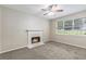 Bright room with fireplace and large window for lots of light at 7420 Bristol Cir, Douglasville, GA 30134