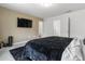 Bedroom featuring a wall-mounted television and neutral tones at 161 Swindon Dr, Mcdonough, GA 30253