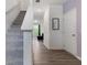 Inviting foyer with hardwood floors, staircase, and stylish decor at 161 Swindon Dr, Mcdonough, GA 30253