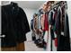 Spacious walk-in closet with ample storage and hanging space at 161 Swindon Dr, Mcdonough, GA 30253