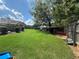 Spacious backyard with a well-maintained lawn and wooden fence, perfect for outdoor activities and relaxation at 345 Annslee Circle Cir, Loganville, GA 30052