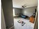 Bedroom with gray walls, ceiling fan, and gaming decor at 345 Annslee Circle Cir, Loganville, GA 30052