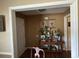 Inviting entryway showcasing decorative table with framed photos, plants, and elegant decor creating a warm atmosphere at 345 Annslee Circle Cir, Loganville, GA 30052