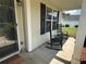 Covered front porch with rocking chairs and decorative plants at 345 Annslee Circle Cir, Loganville, GA 30052