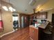 Kitchen with granite countertops, stainless steel appliances, breakfast bar, and hardwood floors at 345 Annslee Circle Cir, Loganville, GA 30052
