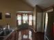Eat-in kitchen with a stainless refrigerator, and view into the breakfast nook at 345 Annslee Circle Cir, Loganville, GA 30052