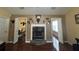 Inviting living room features a stone fireplace and hardwood floors at 345 Annslee Circle Cir, Loganville, GA 30052