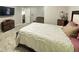 Spacious bedroom features an ensuite bath, sitting area, and plush carpeting at 345 Annslee Circle Cir, Loganville, GA 30052