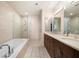 Modern bathroom featuring a walk-in shower, a soaking tub, and a double sink vanity at 3630 Peachtree Ne Rd # 2706, Atlanta, GA 30326