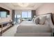 Bright bedroom with a desk, a large TV, and a balcony offering scenic views at 3630 Peachtree Ne Rd # 2706, Atlanta, GA 30326