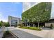 Stately building entrance with meticulously manicured landscaping and convenient circular drive at 3630 Peachtree Ne Rd # 2706, Atlanta, GA 30326