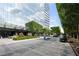 Building entrance with manicured landscaping and convenient circular drive, offering curb appeal at 3630 Peachtree Ne Rd # 2706, Atlanta, GA 30326