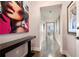 Hallway with hardwood floors and art decorations at 3630 Peachtree Ne Rd # 2706, Atlanta, GA 30326