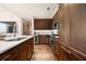 Modern kitchen features stainless steel appliances, marble countertops, and dark wood cabinets at 3630 Peachtree Ne Rd # 2706, Atlanta, GA 30326