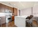 Modern kitchen features stainless steel appliances, marble countertops, and an island with seating at 3630 Peachtree Ne Rd # 2706, Atlanta, GA 30326