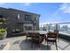 Outdoor terrace with a fireplace, dining table and chairs with a stunning city view at 3630 Peachtree Ne Rd # 2706, Atlanta, GA 30326