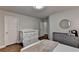 Inviting bedroom with crib, dresser and ensuite bathroom at 4335 Bellview Ln, Duluth, GA 30097
