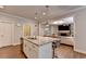 Open kitchen featuring granite counters, stainless steel appliances, and hardwood floors at 4335 Bellview Ln, Duluth, GA 30097