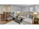 Comfortable sitting area featuring a couch with a chaise lounge and a modern coffee table at 4335 Bellview Ln, Duluth, GA 30097
