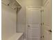 Mudroom includes a bench and hooks providing convenient storage space and organization at 4335 Bellview Ln, Duluth, GA 30097
