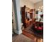 Elegant dining room featuring hardwood floors, an oriental rug, and classic wood furniture at 979 Simonton Glen Dr, Lawrenceville, GA 30045