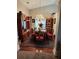 Formal dining room featuring hardwood floors, ornate chandelier, and elegant furniture at 979 Simonton Glen Dr, Lawrenceville, GA 30045