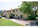 Rear exterior of a well-maintained home with a green lawn and mature trees at 101 Ardmore Nw Pl # 3, Atlanta, GA 30309