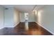 A spacious living room with hardwood floors offers ample natural light and a minimalist design at 101 Ardmore Nw Pl # 3, Atlanta, GA 30309