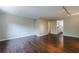 Open layout featuring hardwood floors and view to the kitchen at 101 Ardmore Nw Pl # 3, Atlanta, GA 30309