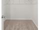 Walk-in closet space showing a wire rack for storage at 114 Crooked Lake Park, Villa Rica, GA 30180