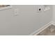 Laundry room featuring hookups, an outlet, and gray tile flooring at 114 Crooked Lake Park, Villa Rica, GA 30180