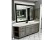Beautiful bathroom with a large mirror and granite countertops at 2550 Lynshire Ln, Snellville, GA 30078