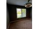 Dark bedroom featuring a window at 2550 Lynshire Ln, Snellville, GA 30078